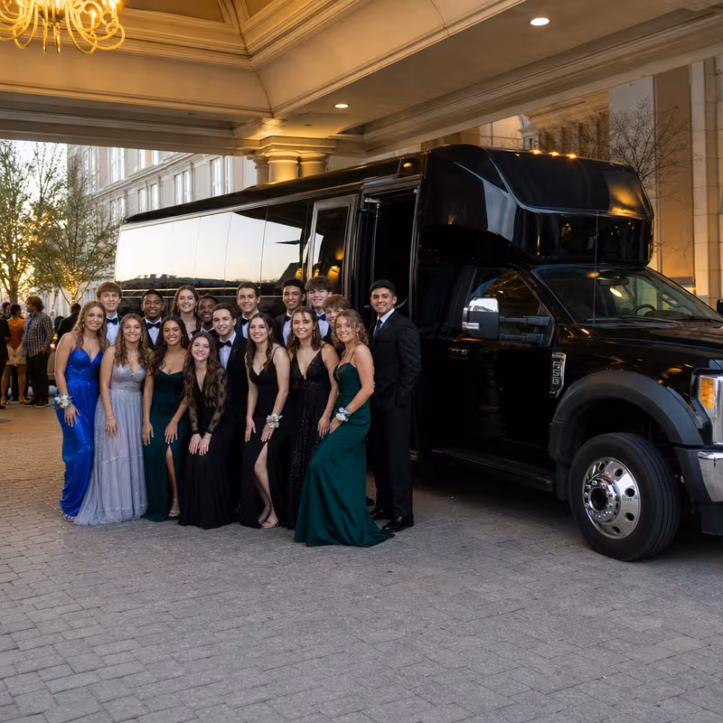 Party bus interior with wraparound leather seating and LED lighting in Indianapolis
